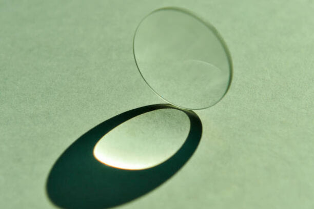 Choosing refractive index for prescription lenses
